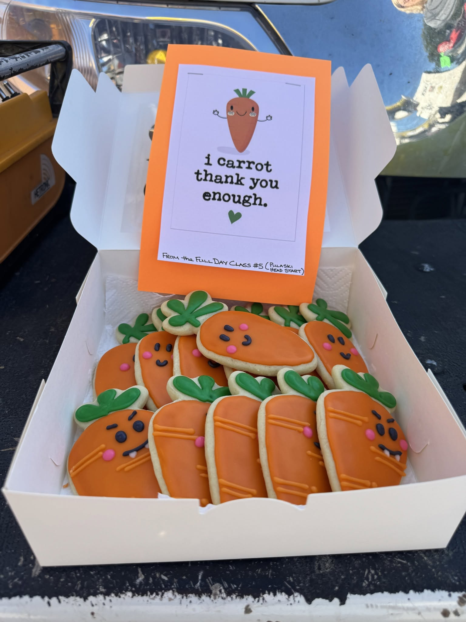 Custom carrot shaped decorated sugar cookies made by Yum Tums by Cyn